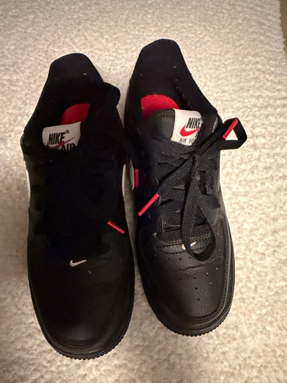Nike Black Sneakers with Red Highlights